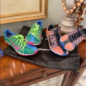 Two Pairs of Nike Rival XC Shoes